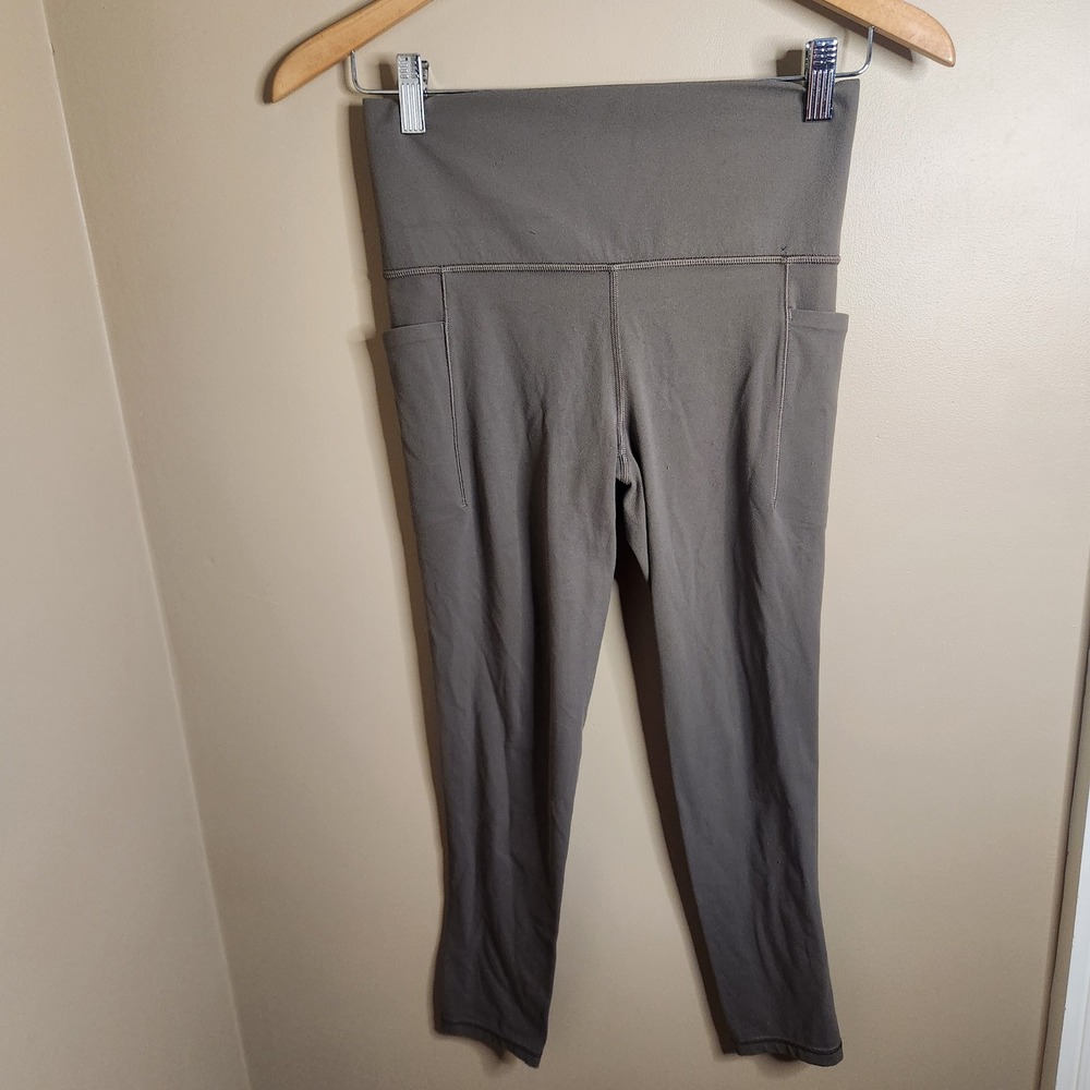 Athleta Salutation Stash Pocket II 7/8 Tight Olive Green High Rise Leggings S